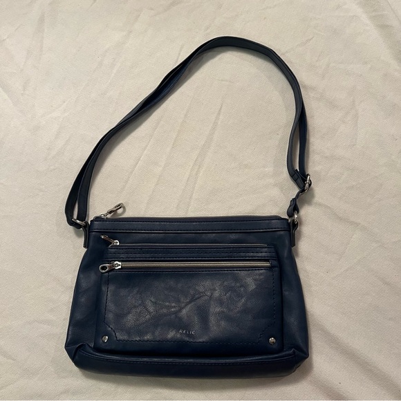 Woman’s leather vintagecrossbody purse/bag.